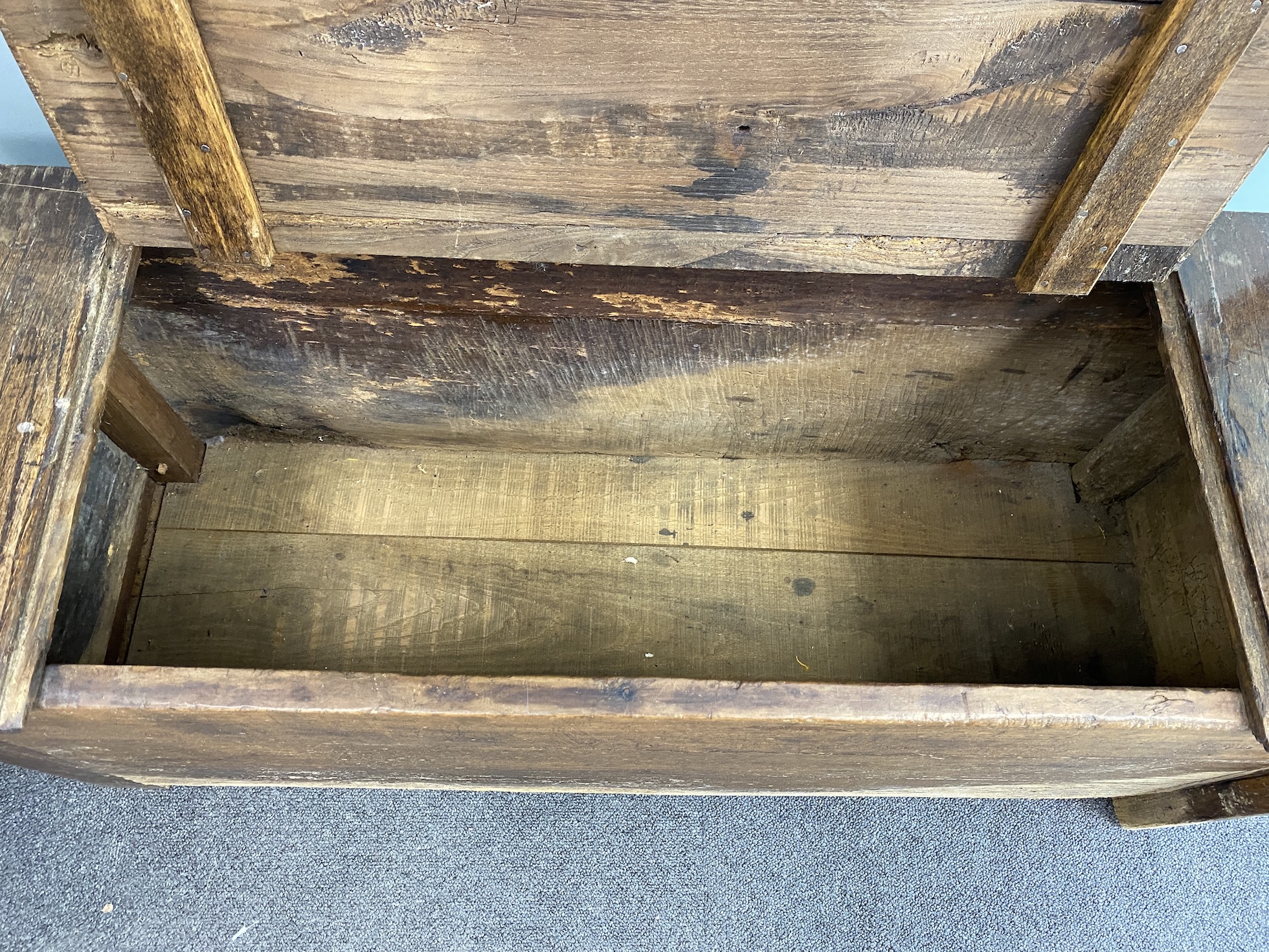A French provincial oak hall chest, with a single side arm rail, width 98cm, depth 36cm, height 72cm